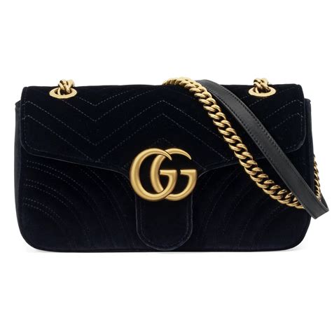 black velvet gucci purse.